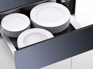 Сколько тарелок может вместить подогреватель посуды ASKO?